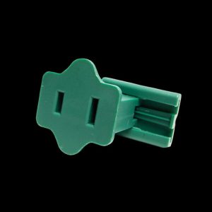 A Female Slide Plug SPT-2/Green plastic outlet cover with two rectangular slots