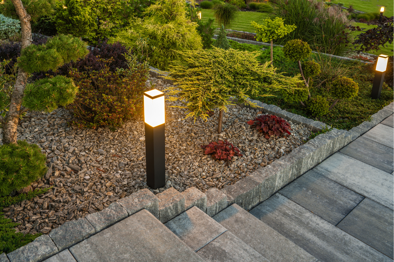 Square pathway lights black medium highlight shrubs and mulch NEI Distributors North Reading MA.
