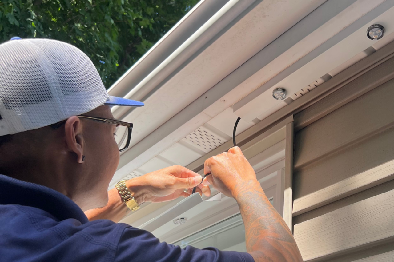 Permanent white roofline lighting installation by NEI Distributors North Reading MA.